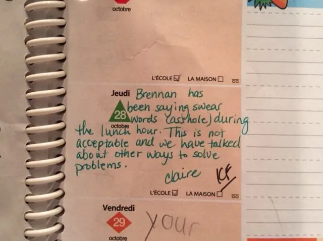 Handwritten note in a school agenda.